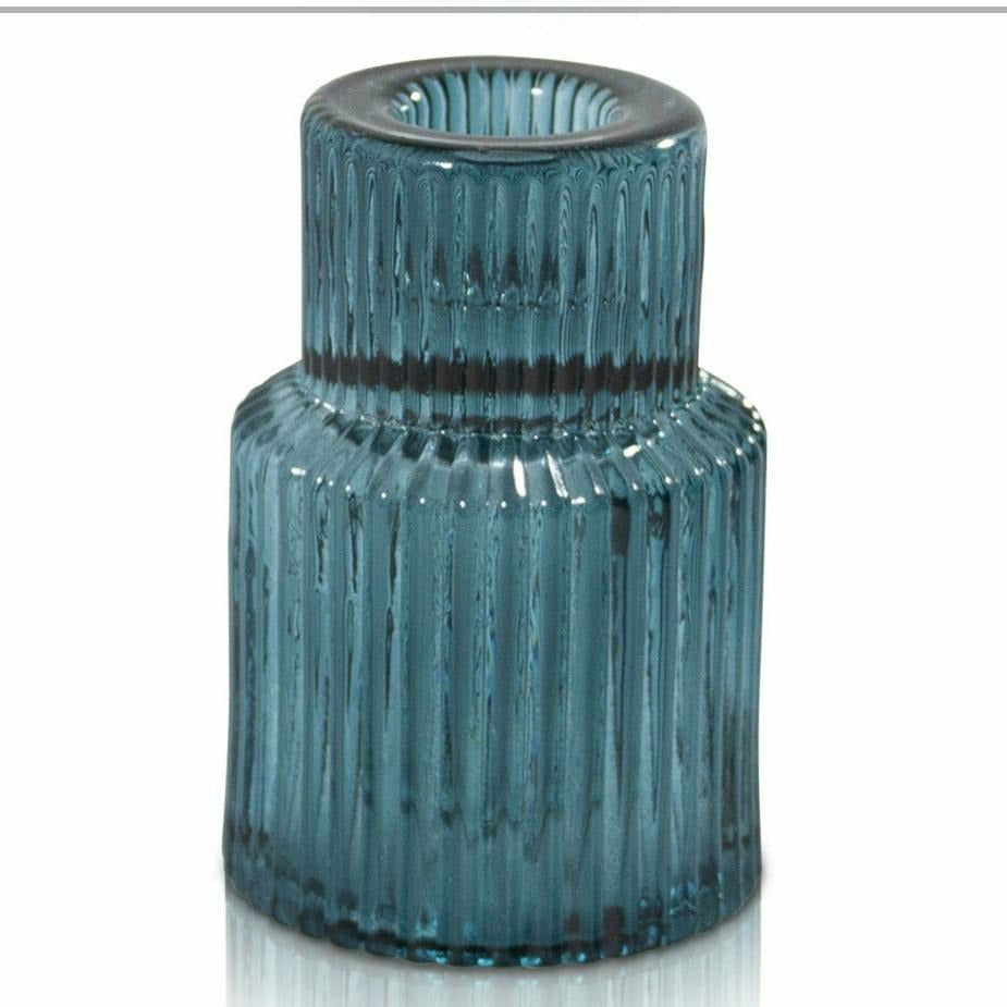 
                  
                    Arlo Vintage Glass Candle Holder in Ocean has a gorgeous, retro silhouette and stylish pleated glass finish. Cleverly designed to suit multiple candle types.
                  
                