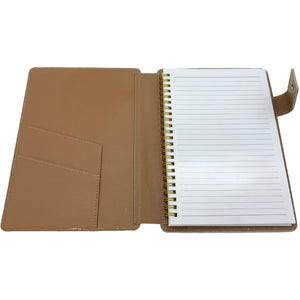 
                  
                    A5 COVERED NOTEBOOK BY ON HER DESK
                  
                